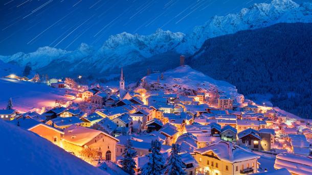 Star trails over Ardez village, Graubunden, Switzerland (© Roberto Moiola/Getty Images)