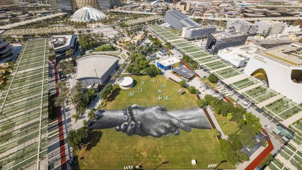 'Beyond Walls' land-art installation by Saype at Expo 2020 Dubai, United Arab Emirates (© VALENTIN FLAURAUD/EPA-EFE/Shutterstock)