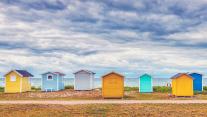 Bathing huts on the beach in Skåne County, Sweden 