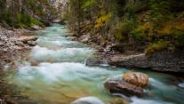 Water flows through Johnston Canyon in Banff National Park 