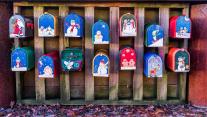Winter themed hand painted mail boxes for 'Sea Village' floating home residents, Granville Island, Vancouver 