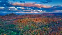 Thuringian Forest in autumn with Wartburg Castle, Germany 