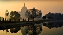 Beautiful foggy winter sunrise at Victoria Memorial, Kolkata, India. 