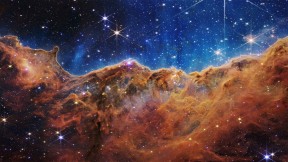 【2022-11-20】 宇宙悬崖，船底星云 船底星云中的宇宙悬崖 (© NASA, ESA, CSA, and STScI)