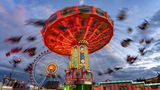 Swing carousel at Oktoberfest, Munich, Bavaria, Germany (© LOOK-foto/Alamy)